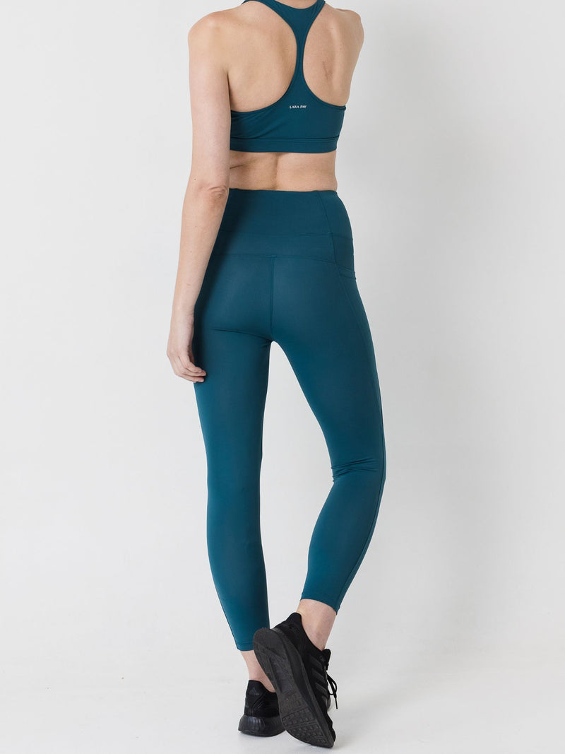 green long workout legging with side pockets and waistband pocket